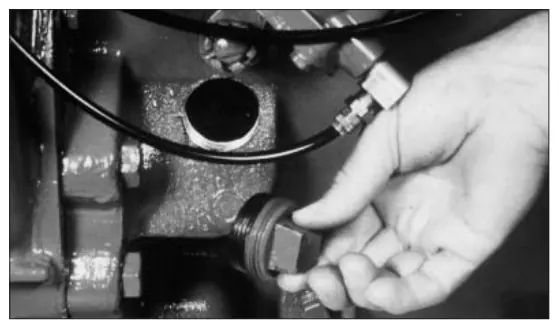 Fig. 12, figura del manual de servicio Chelsea 489: Lubricante en la transmisión/revisión de la instalación